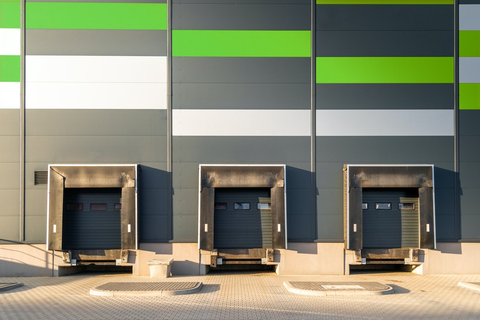 cargo loading dock doors of big warehouse building outdoor